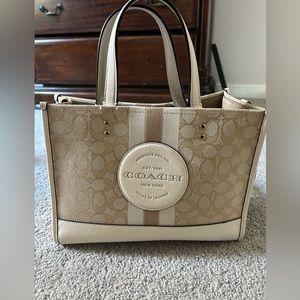 Coach Dempsey Carry all crossbody bag